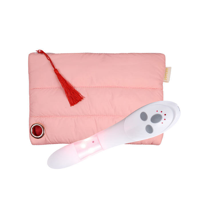 Pink padded puffer-style travel bag with modern, lightweight design on a light background.